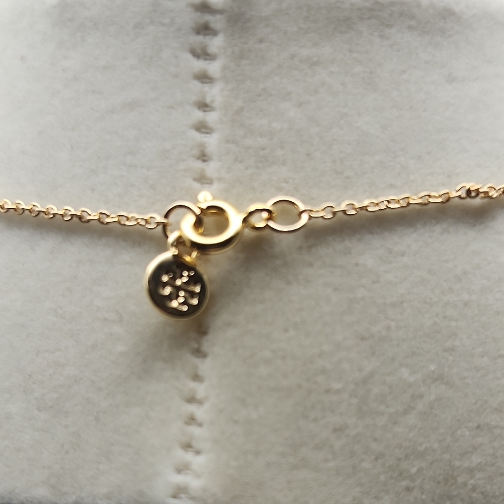 Tory Burch Black and Gold Emblem Necklace - Picture 6 of 9